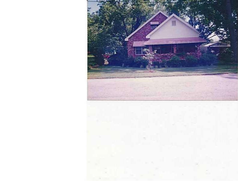 Exterior Front. Older pic of home.