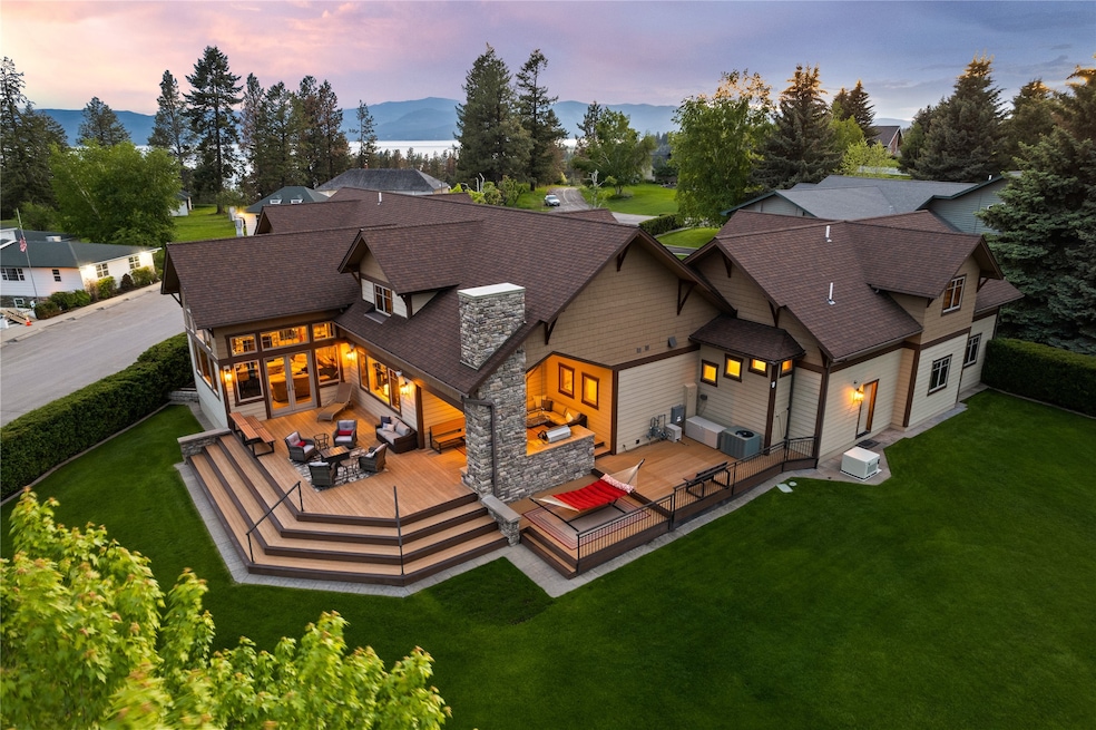 Backyard entertaining with Flathead Lake in the distance.
