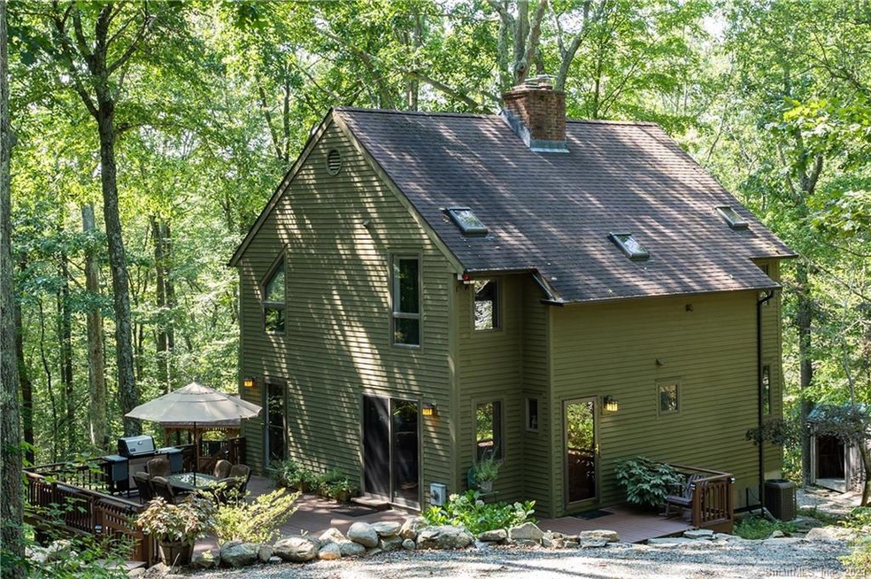 Warm and inviting home on over 2 acres of private 