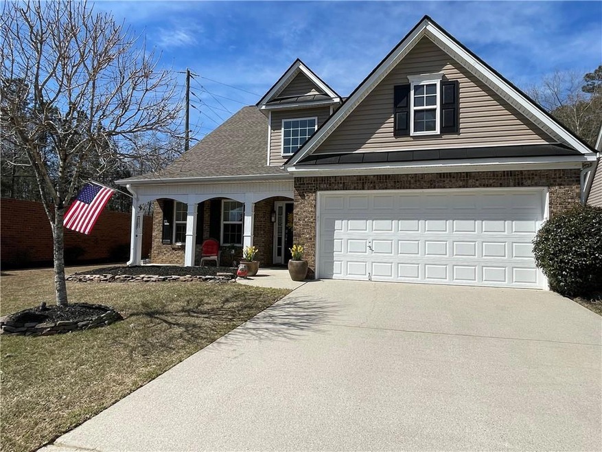 This is a must see home in Flowery Branch, close t