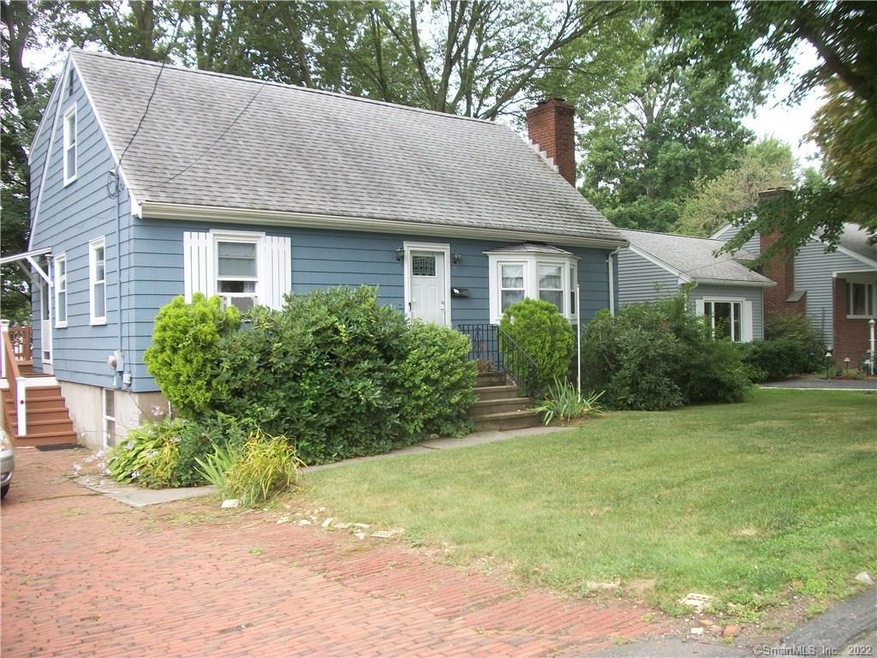 Front entry, brick driveway
