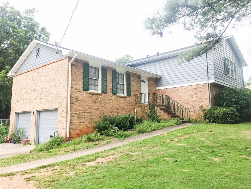 5211 Lilburn Stone Mountain Rd SW, Lilburn, GA 30047 - photo 1