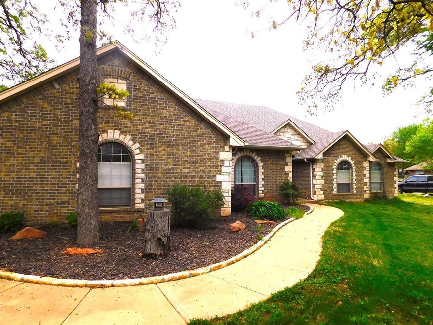 View of front of property with a front yard