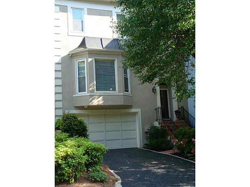 Exterior Front. Hard coat stucco