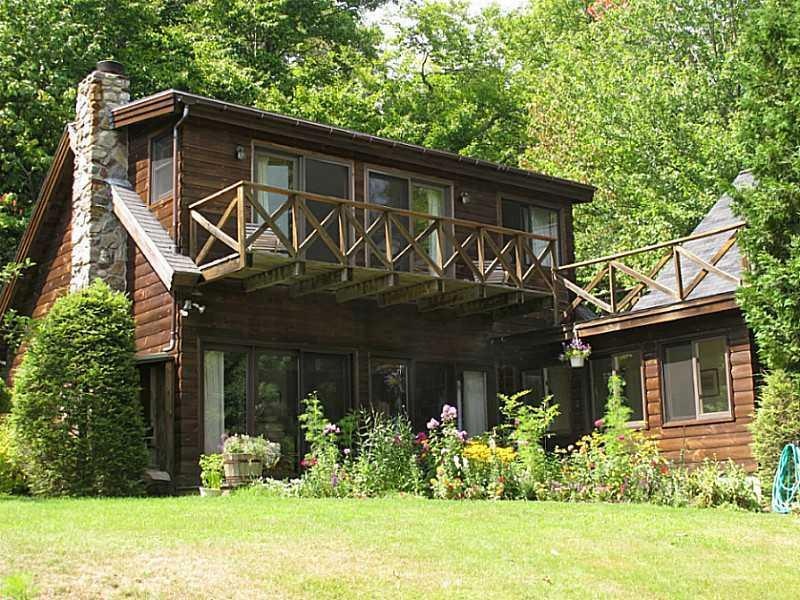 Exterior Front. View from the lake