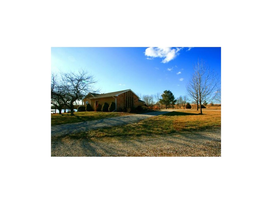 Drive up to this beautiful Ranch that sits on 5 ac