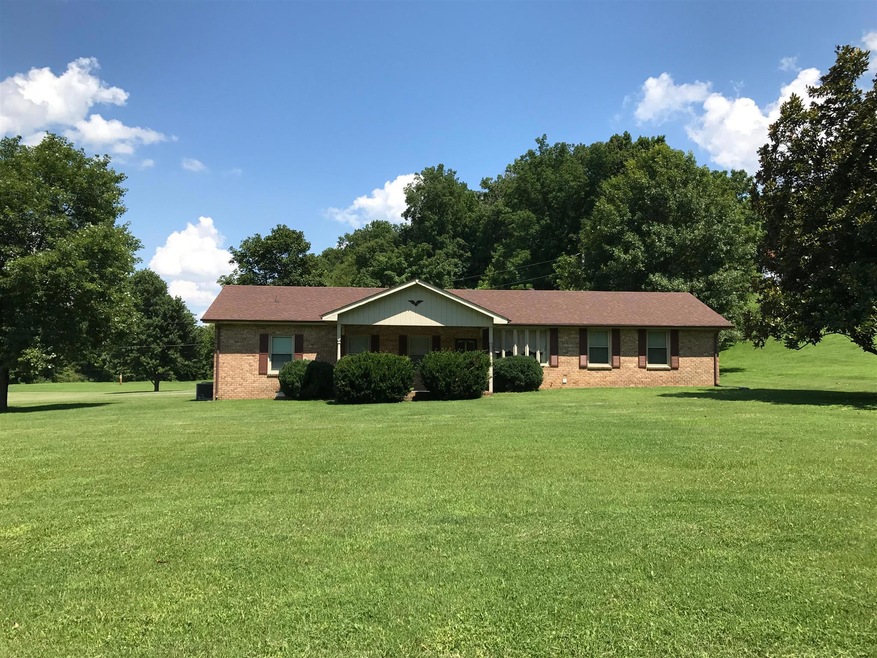 Adorable 1 story ranch on a full acre!