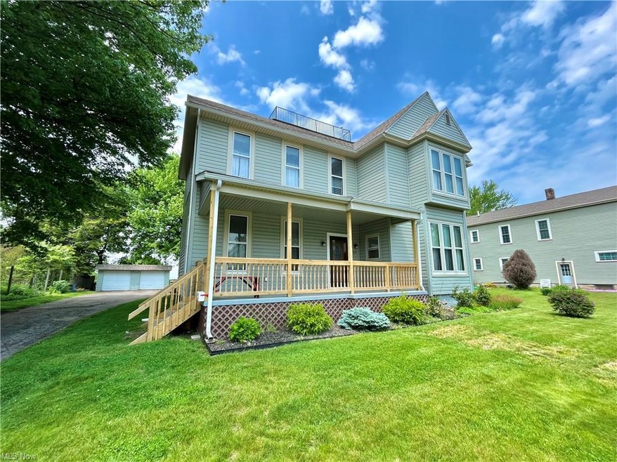 Street View of this 4 bedroom 3 bath beauty