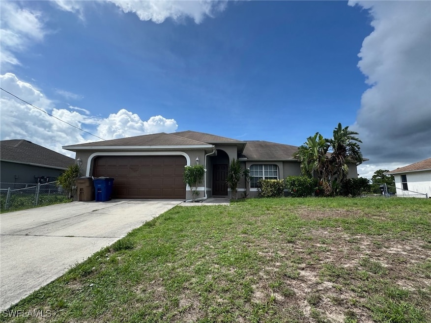 1142 Emory St E, Lehigh Acres, FL 33974 - photo 1