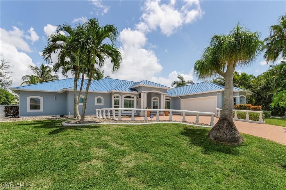 View of front of home with a front yard, a standin