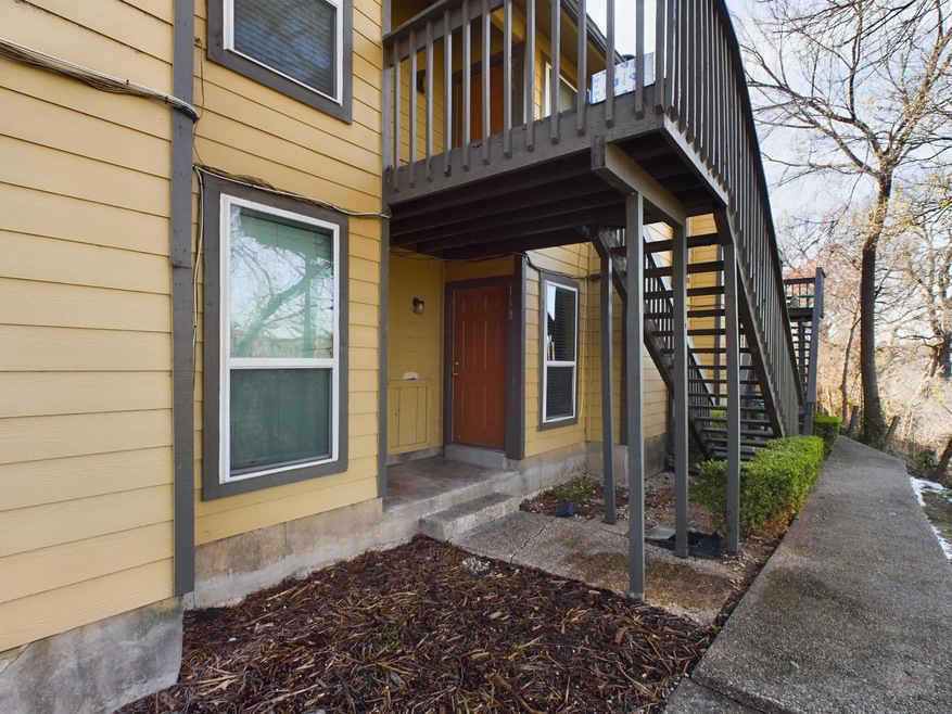 Entrance to property with a wooden deck