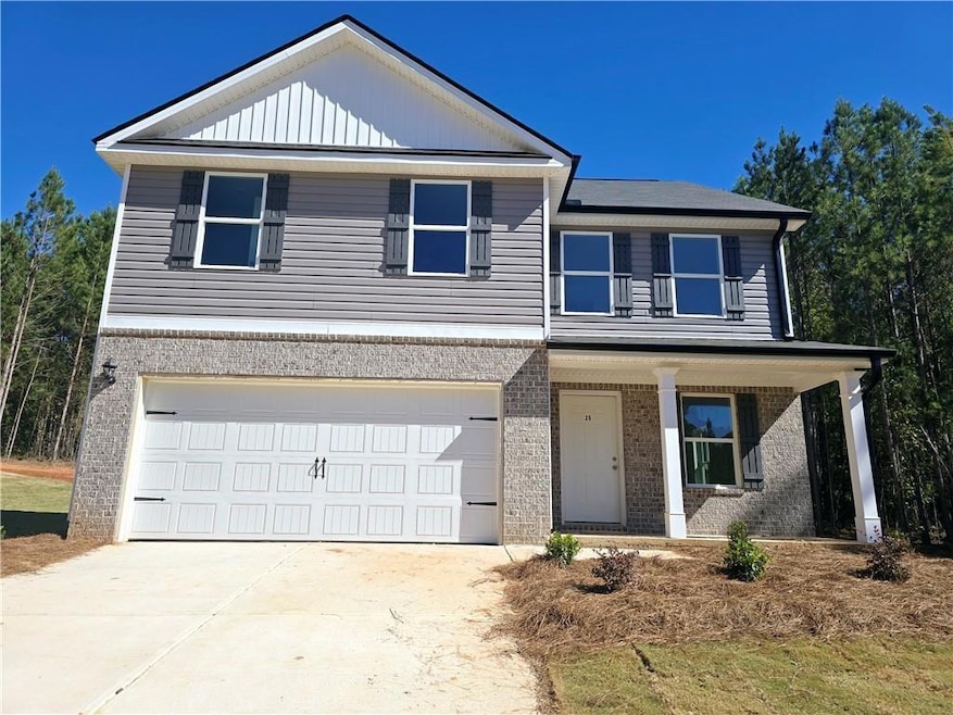 View of front of home featuring a garage