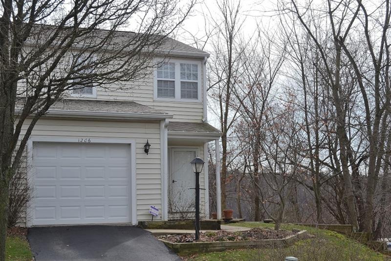FRONT EXTERIOR. This beautiful end-unit in Foxview
