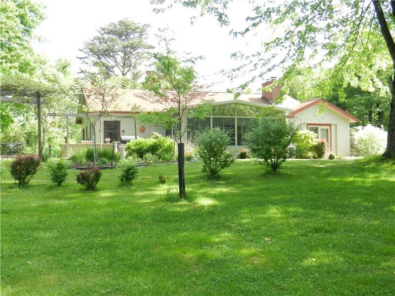 Exterior Front. Bungalow style ranch on a .70 beau