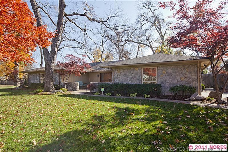1965 Stone Contemporary style home located in a qu