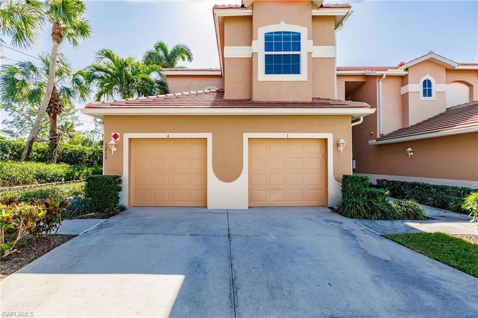 Mediterranean / spanish-style house with a garage