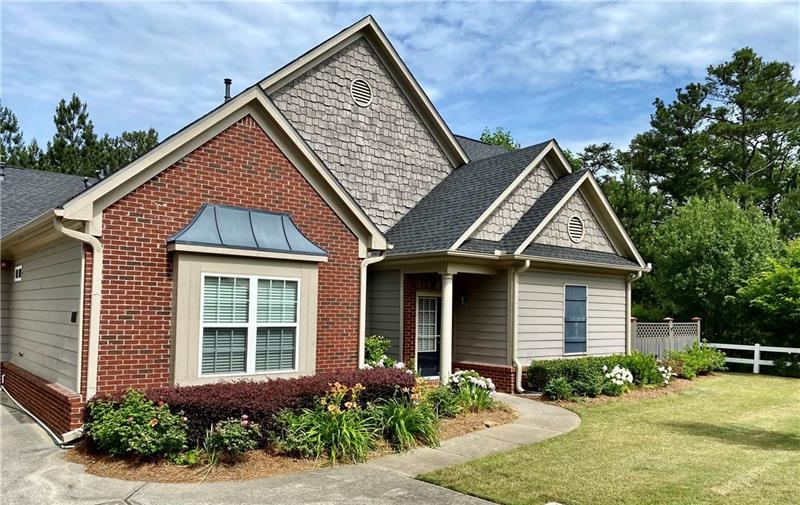 Beautiful, single-level townhome, tucked away on a