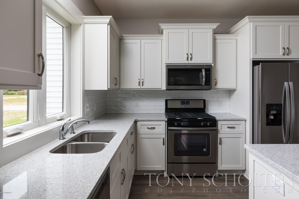 966 Harper Woods Dr SW unit 1, Byron Center, MI 49315 - photo 1