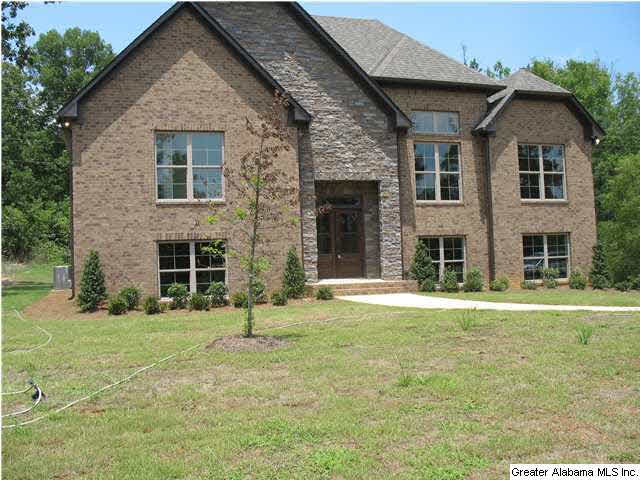 Great level lot, with stacked stone on front facin