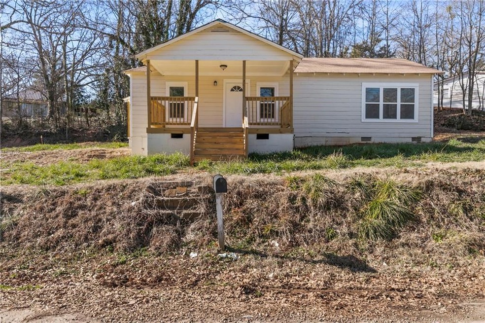 View of front of property featuring a porch