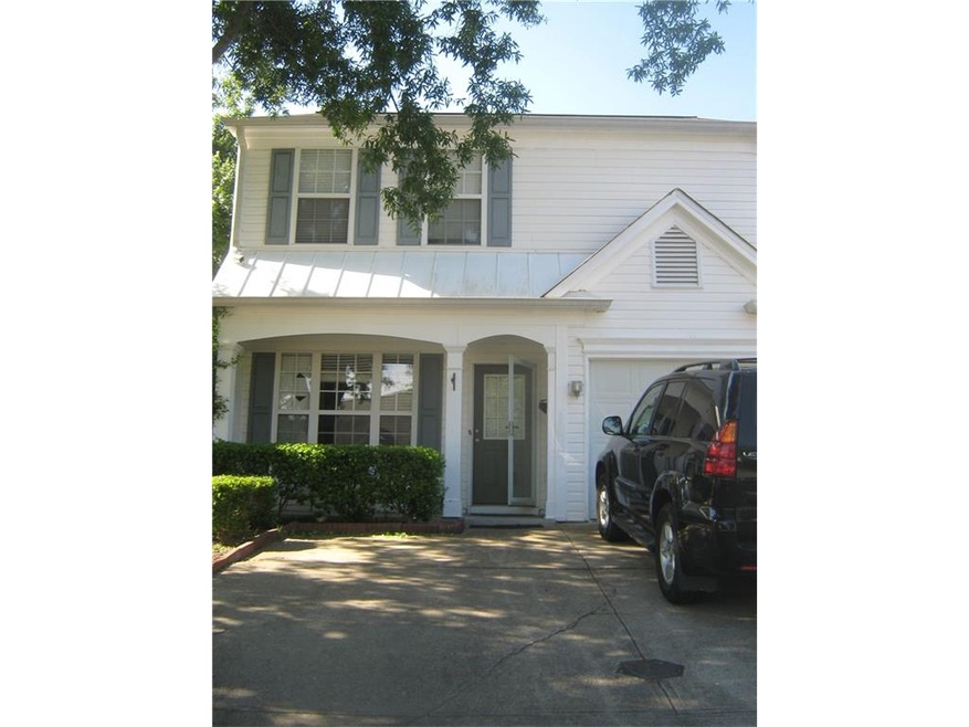Front of house, one car garage