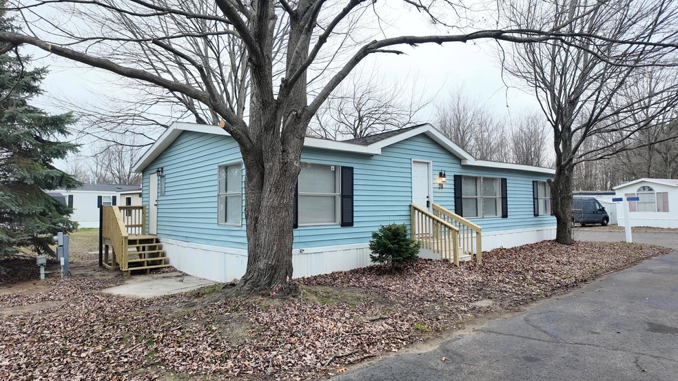 1281 E Pontaluna Rd unit 28, Norton Shores, MI 49456 - photo 1