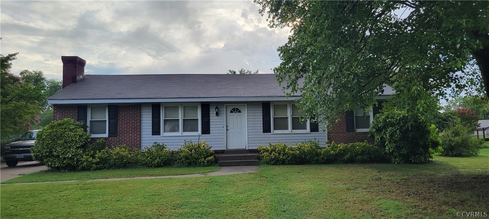 View of front of house with a front yard