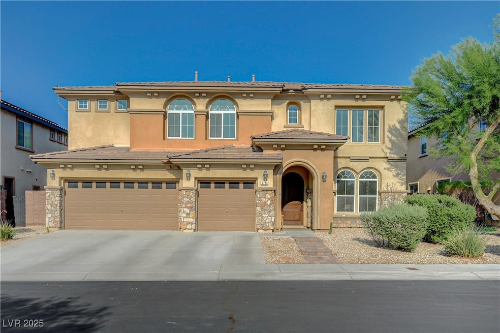 Mediterranean / spanish-style house with an attach