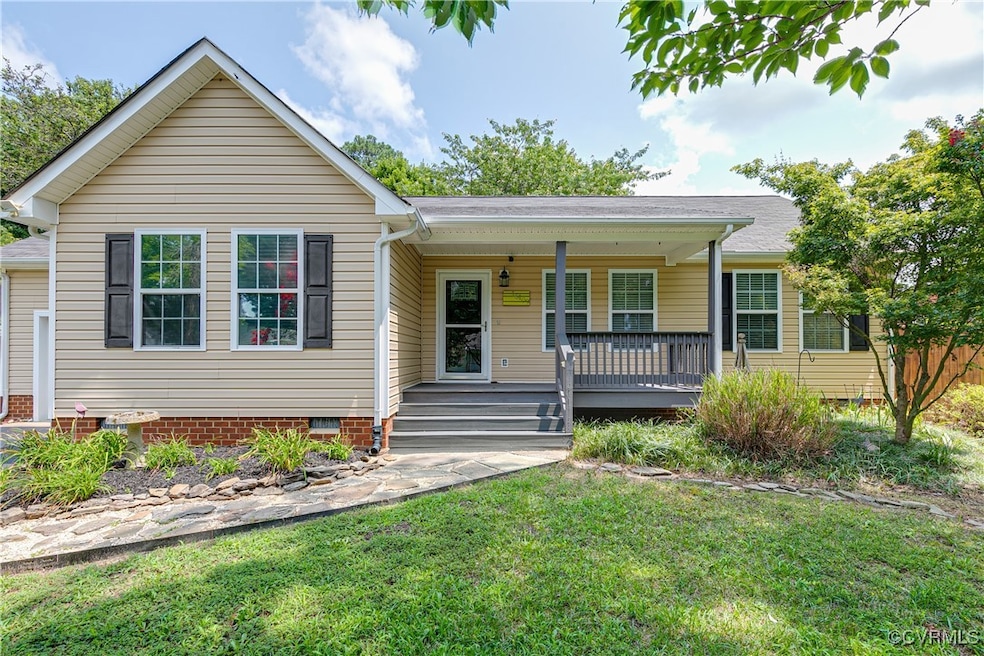 View of front of property with a front lawn