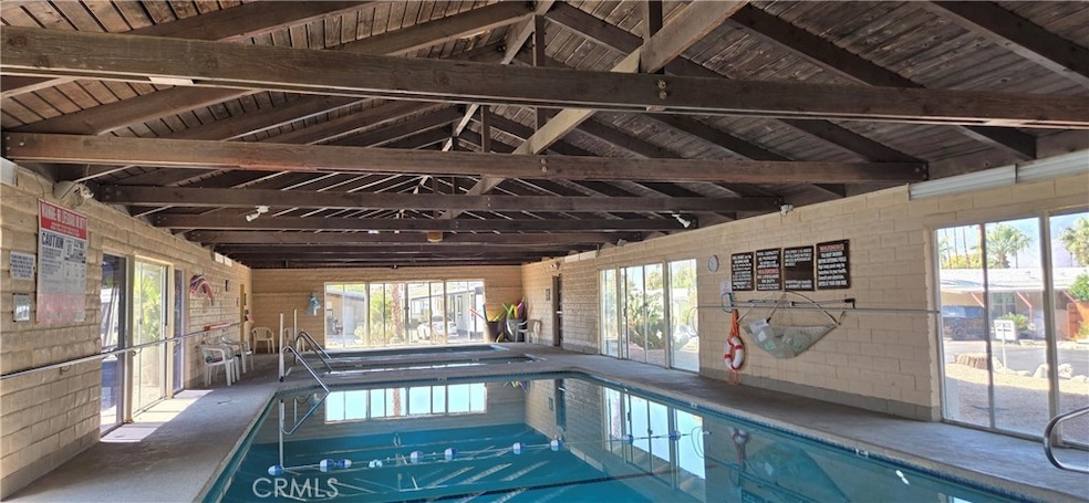 Community - Enclosed spring water fed pool.