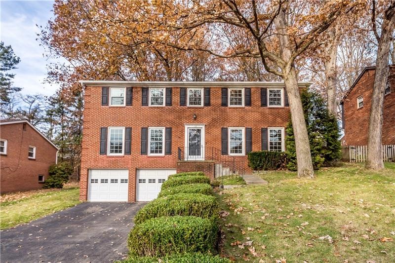 Stately brick colonial situated in the heart of Mo