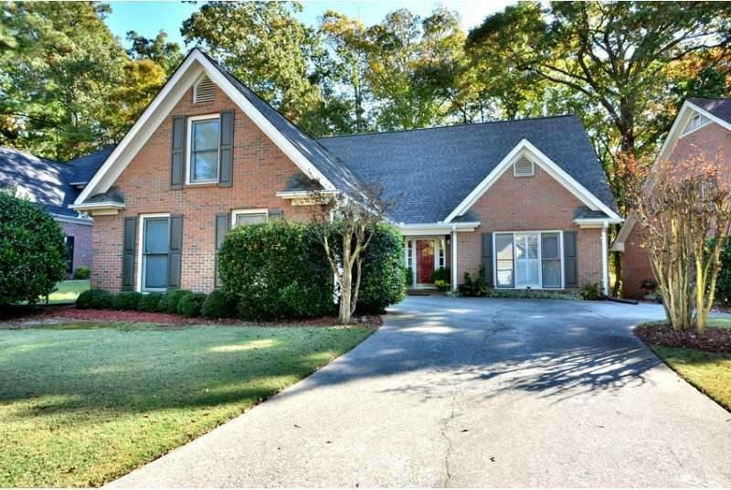 Exterior Front. Four Sided Brick Beauty just minut