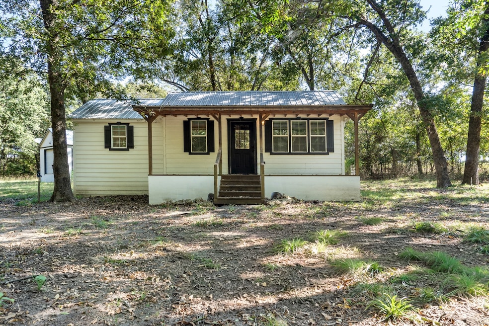12295 S Bee Emet Rd, Milburn, OK 73450 - photo 1