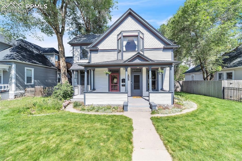 Victorian-style house featuring a porch