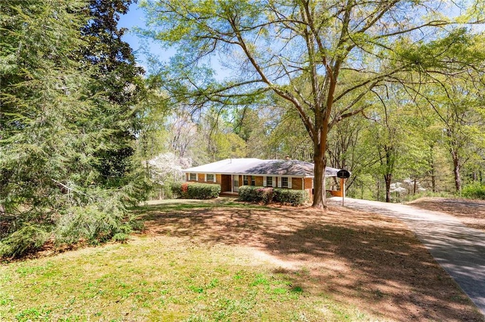Welcome to your private oasis in East Cobb!