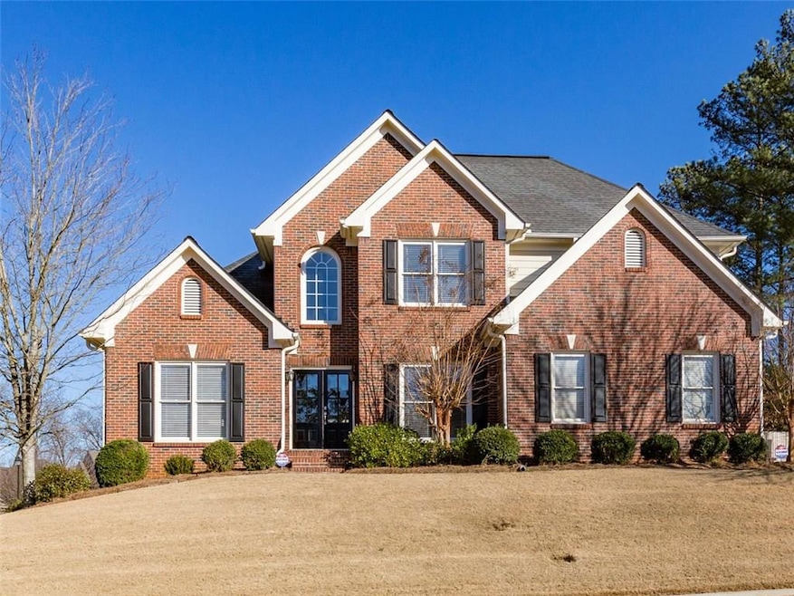 Beautifully maintained and updated brick and concr