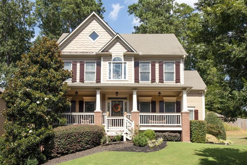 Front exterior with large sitting porch