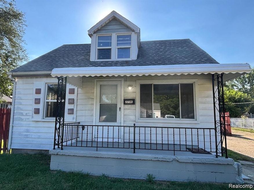 Bungalow featuring roof with shingles and a porch