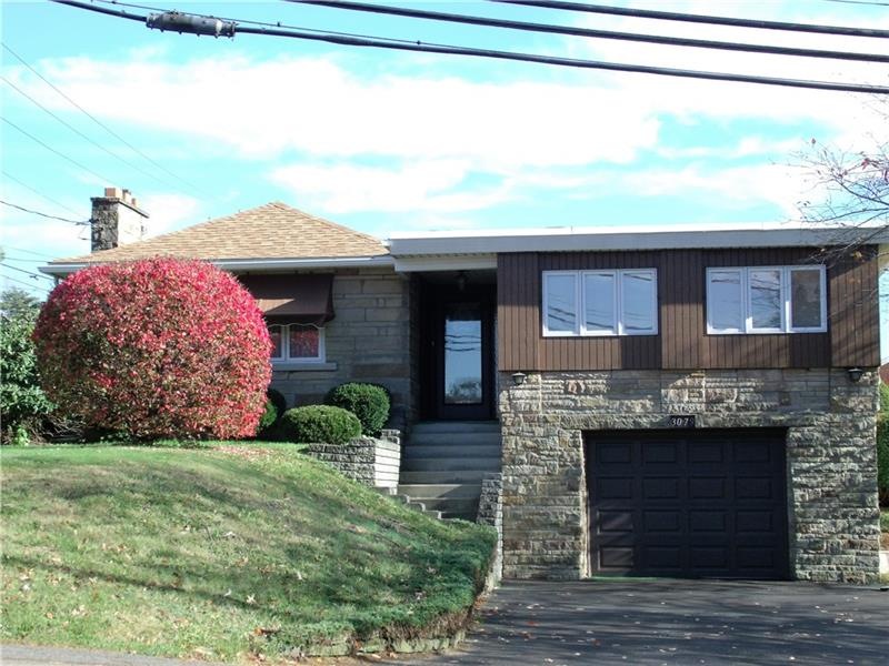 Well maintained stone ranch on a level lot in the 