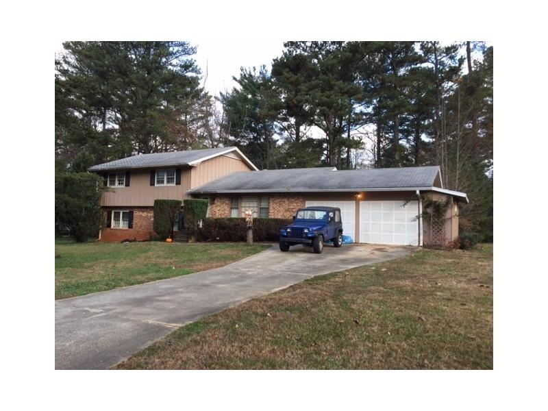 Brick and Frame split-level home on huge corner lo