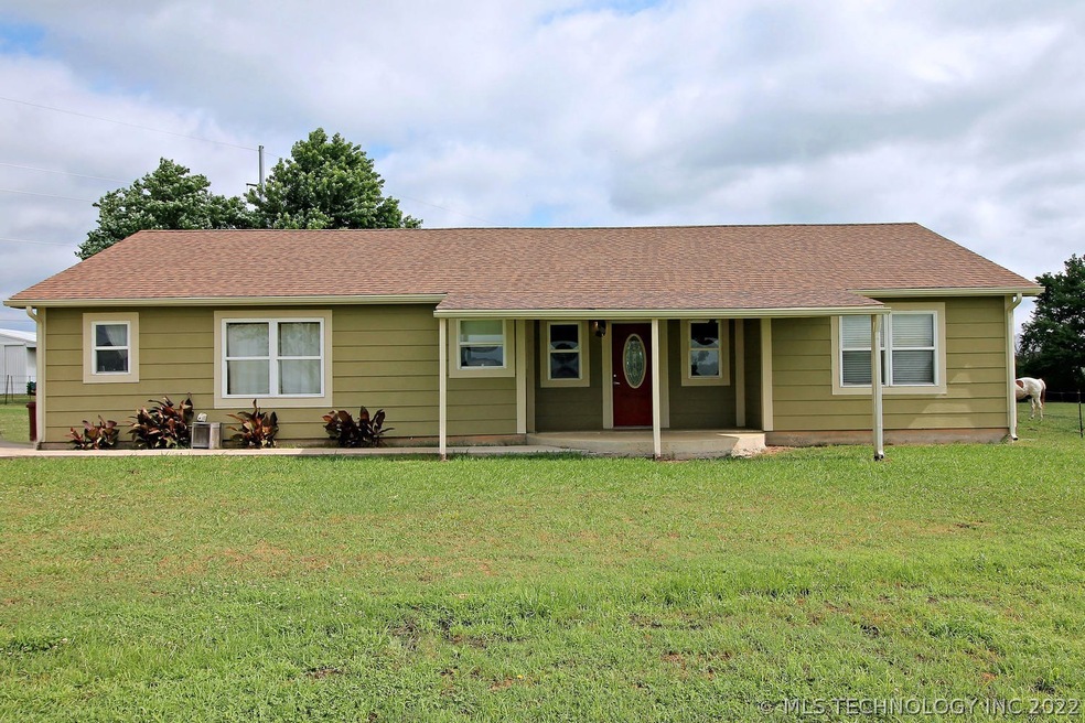 One story home with shop on 2.11 acre lot on a bea