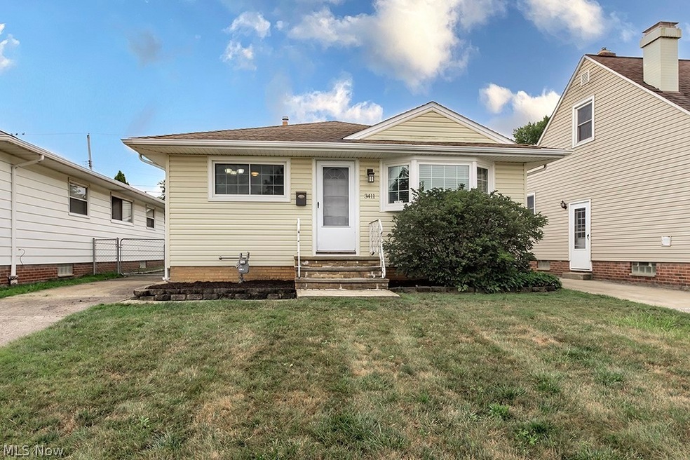 Bungalow-style house featuring a front yard