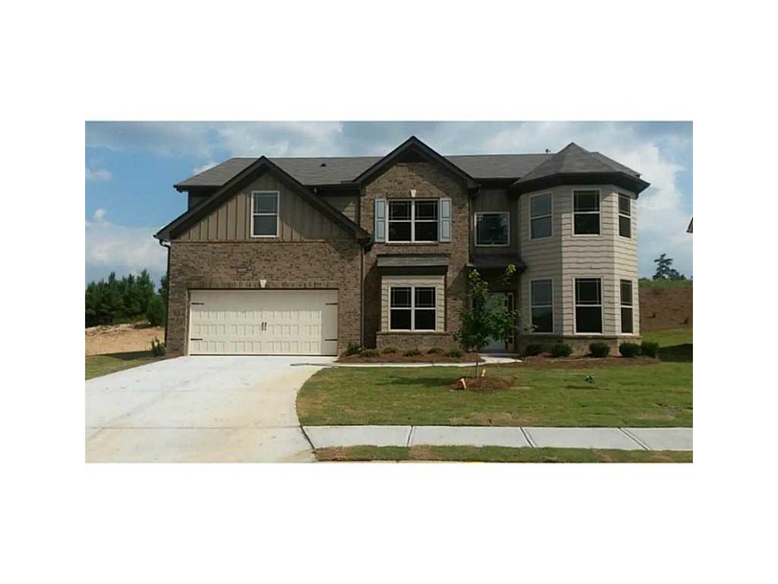Exterior Front. SHUTTERS still to be painted and t