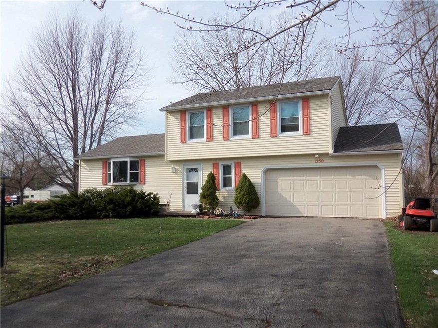EXTERIOR FRONT- NEW SIDING, WINDOWS, ENTRY DOORS!