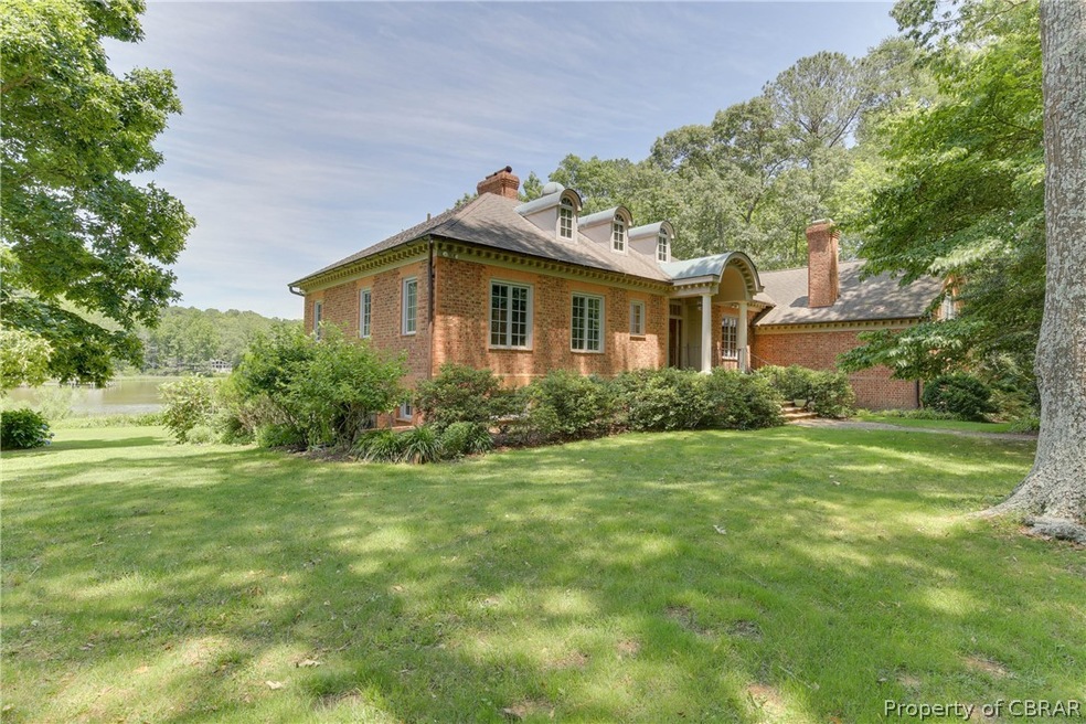 Beautiful custom designed brick home on Queens Cre
