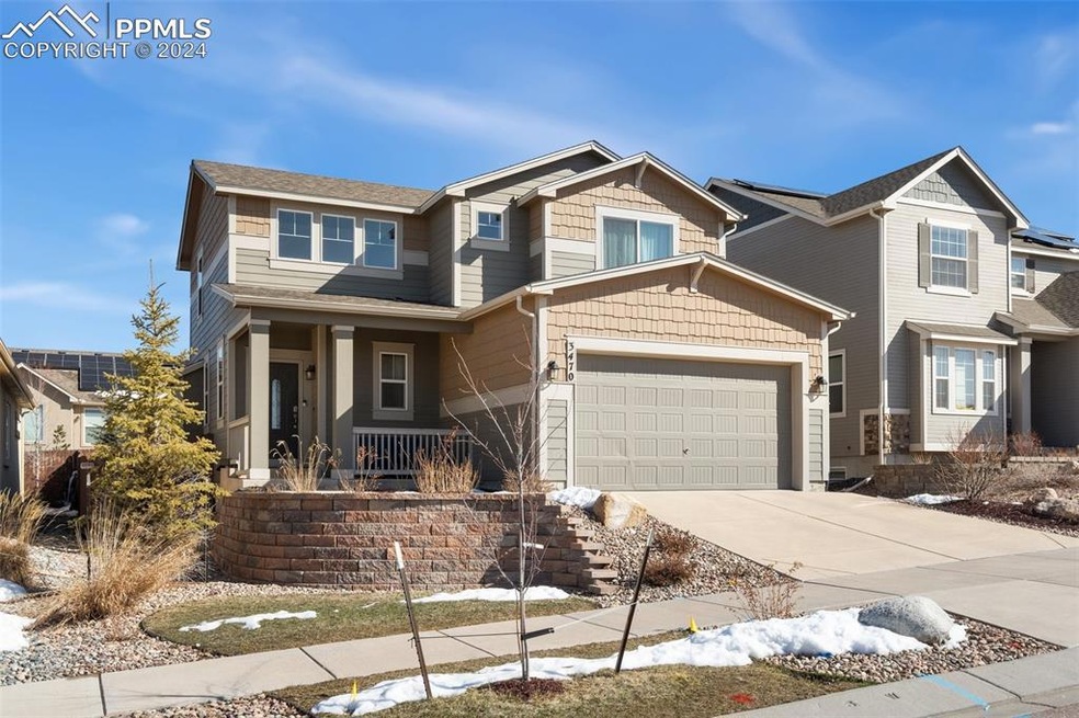 Craftsman house with covered porch and a garage