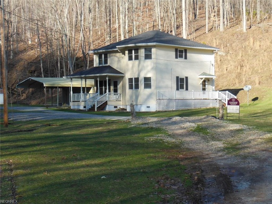 Serene setting for this 3-BR, 2-BA home with 39.38