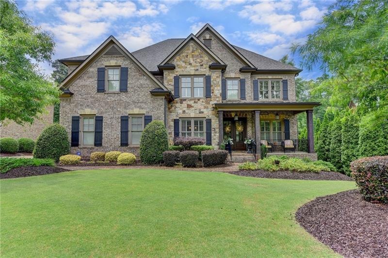 Beautiful stone & 4 side brick. Brick front porch 