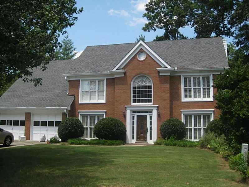 Exterior Front. 3-Sides brick, 2-family rooms in c