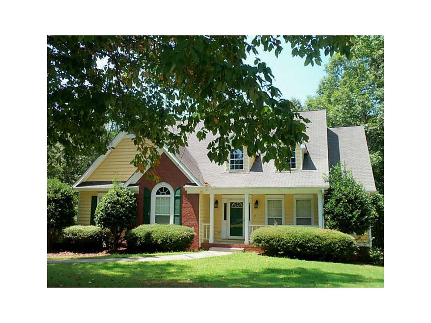 Exterior Front. Lovely setting for this 4 bedroom/